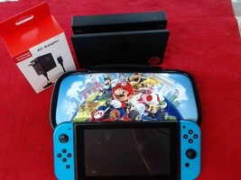 Nintendo Switch (Includes Charger, Dock and Storage case) Tested & Reset